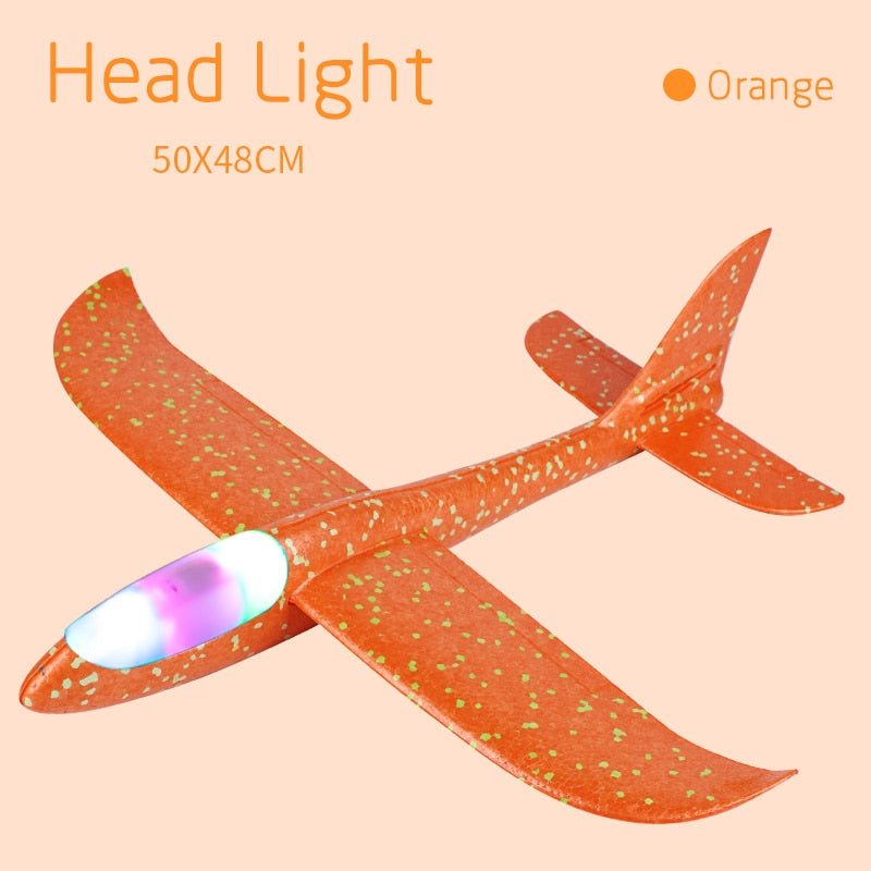 Orange glider with a headlight.