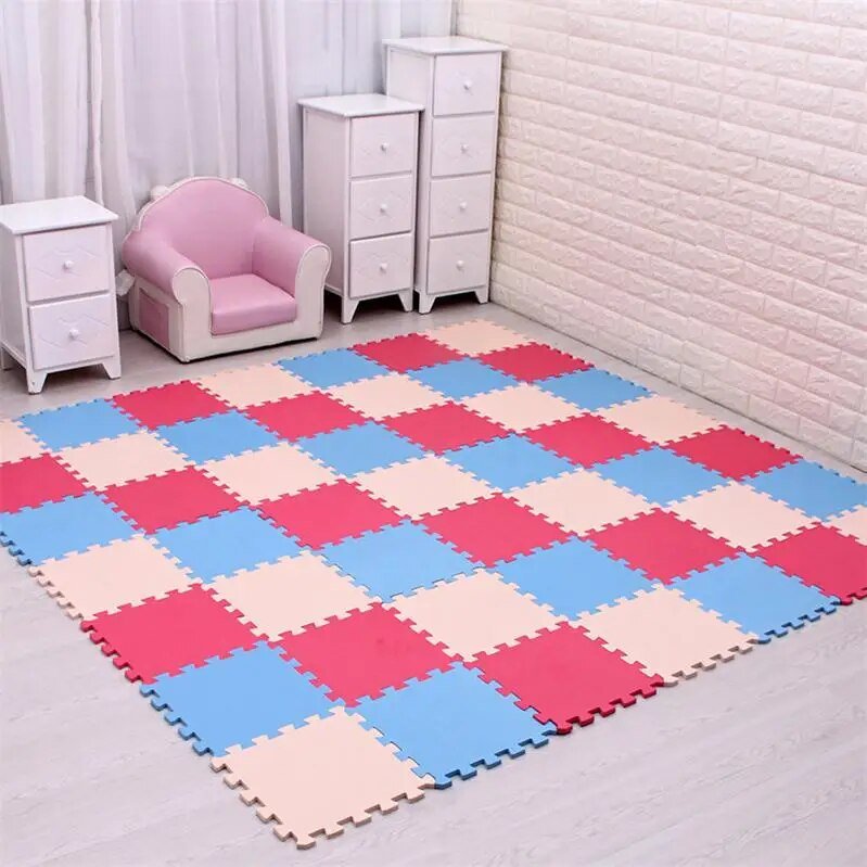 Checkered foam mat on a floor with children's furniture.