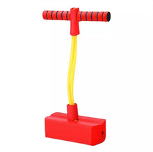 Red pogo stick with yellow spring.