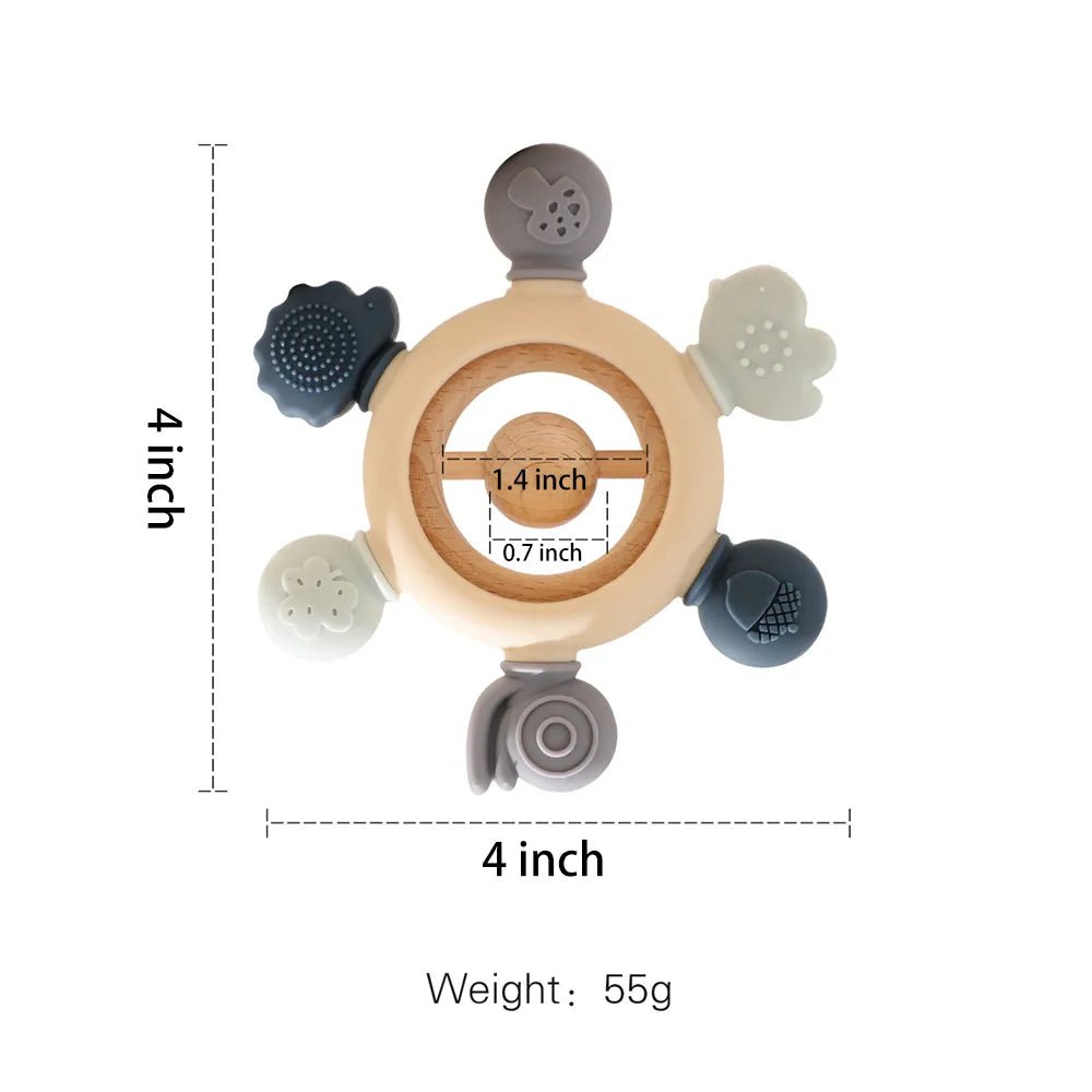 Forest Teether silicone rattle in pastel shades for soothing teething babies and encouraging grasping.