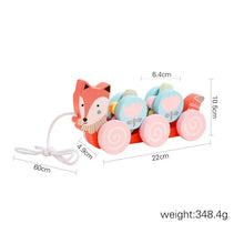 Montessori wooden train and trolley toy in a classic design featuring a fox-shaped piece with measurements.