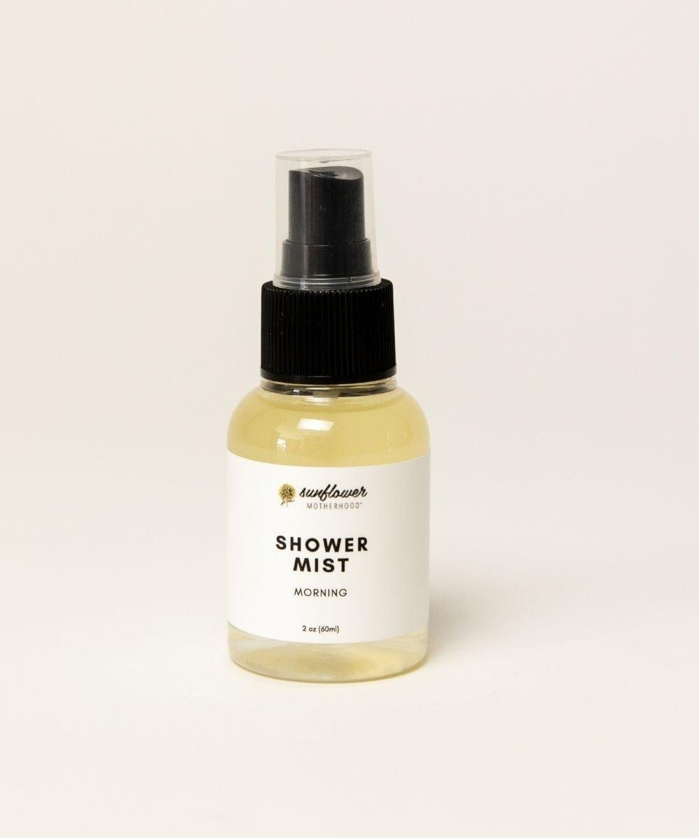 Bottle of morning shower mist steam booster with fresh citrus scent for daily wake-up shower routines.