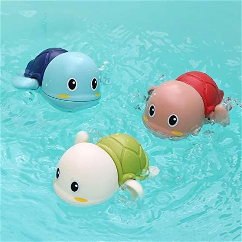 Frogs Clockwork Swimming Bath Toy shown with colorful turtle toys swimming for bath time fun.