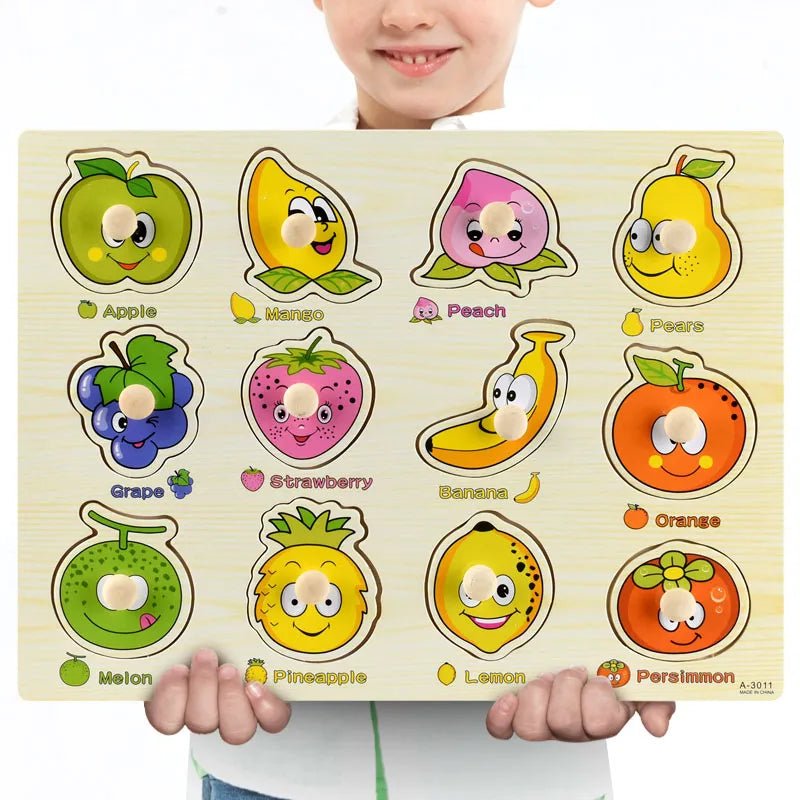 Child holding a Montessori wooden fruit puzzle with names for shape matching and sorting practice.