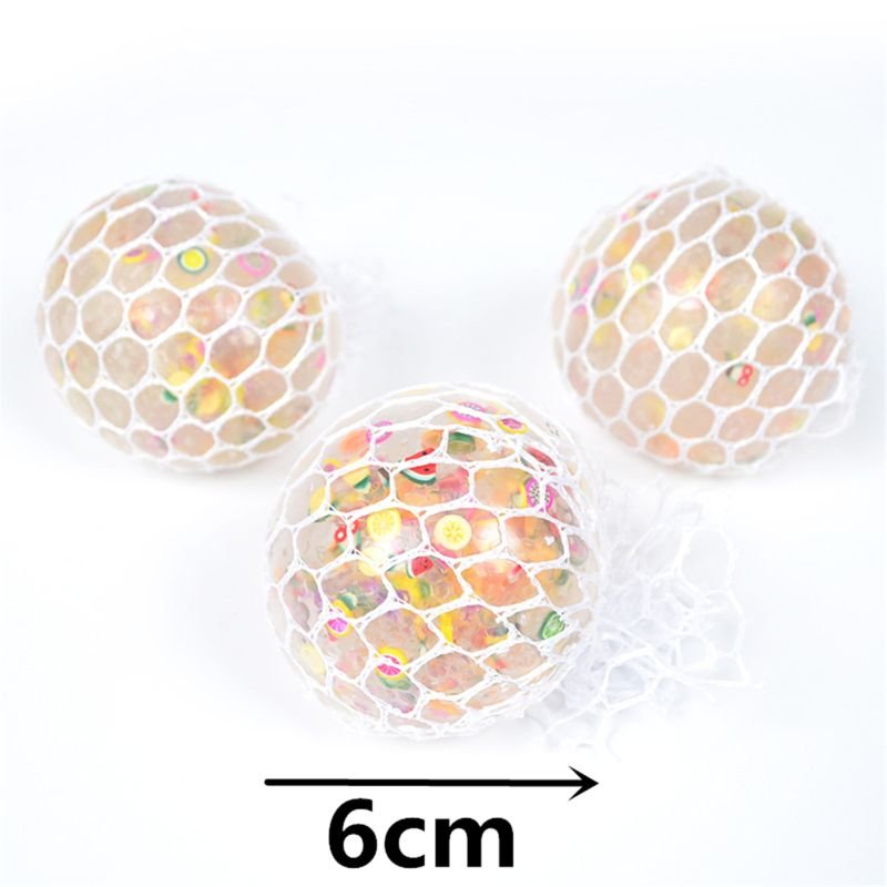 Three 6cm fruit slice grape squishy balls with a honeycomb texture, squeeze toys for stress relief and gifting.