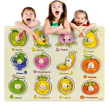 Children playing with a Montessori wooden fruit and vegetable puzzle as an early learning toy for group play.