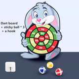 A dartboard with a cartoon character holding it, accompanied by three sticky balls and a hook.
