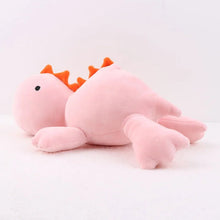 Giant 60cm pink dinosaur weighted plush toy with orange spikes for kids to cuddle and hug.