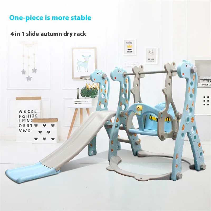 Giraffe slide and swing playset with monkey bars set up indoors for active play.