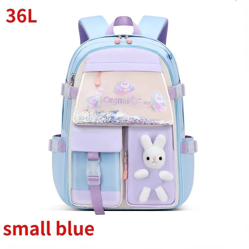Girls large 55L waterproof school backpack in blue with a bunny plush charm for school days, trips, and weekend outings.