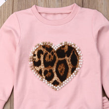 Girls pink leopard heart sweatshirt with pearl trim for warm everyday layering in cooler months.