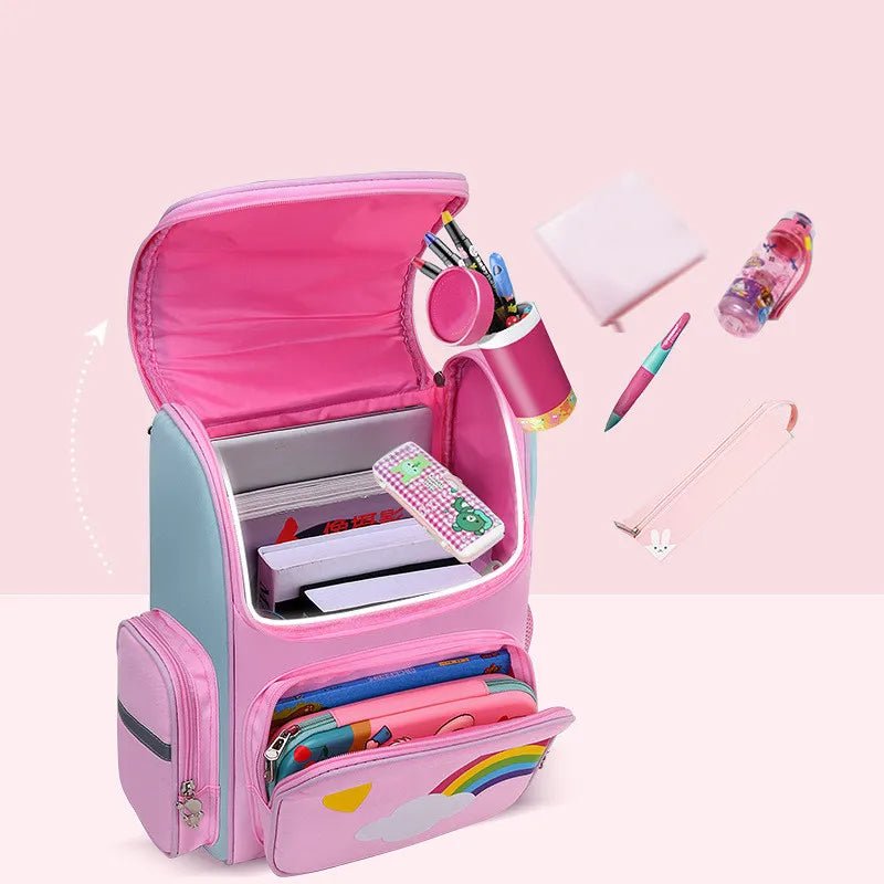 Girls Unicorn School Backpack elementary student bag shown with matching pencil case for school supplies.