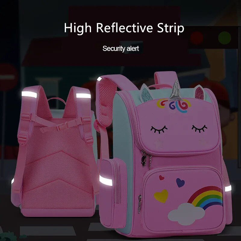 Girls Unicorn School Backpack elementary student bag in pink with a reflective strip for safe commutes.