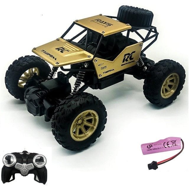 Gold and black 4WD RC monster truck with battery and charger for high-speed racing on outdoor tracks.
