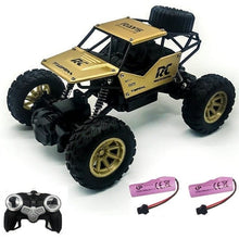 Gold and black RC racing car kit with remote and batteries for high-speed runs on tarmac and dirt tracks.