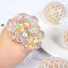 Close-up of the 6cm grape slice anti-stress squishy toy, a colorful mood vent squeeze ball for kids and adults.