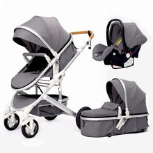 Gray 3-in-1 baby stroller shown in bassinet mode with matching car seat.