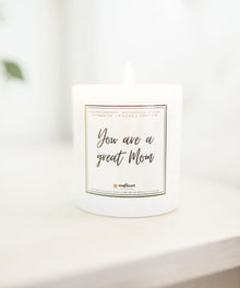 White candle with a label.