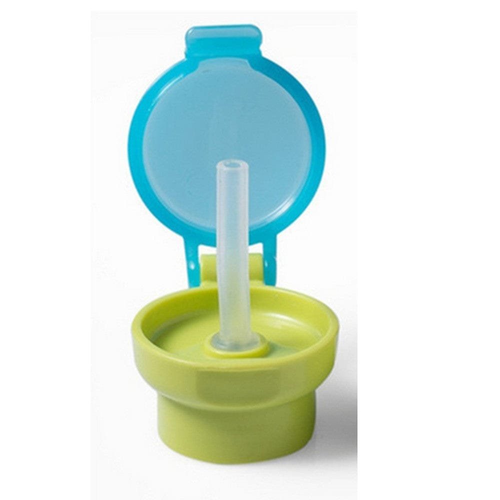 Green and blue spill proof bottle cap with straw for toddlers drinking juice and water without spills.