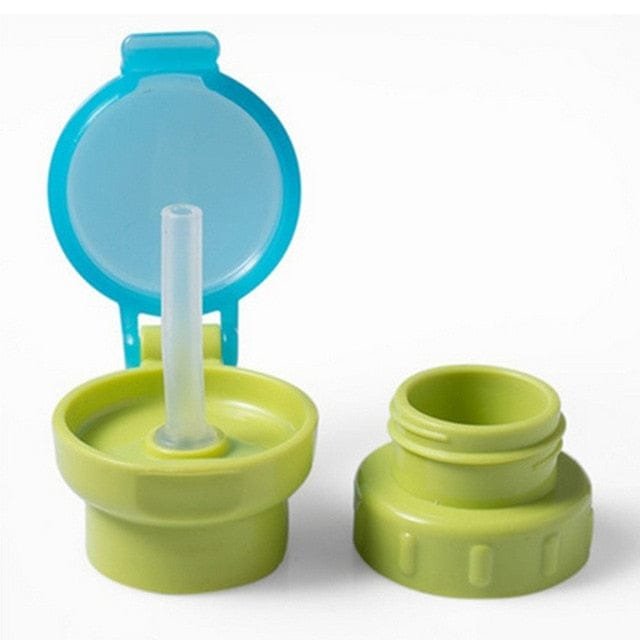 Green and blue twist cap straw bottle lid for toddler spill free drinking during play, travel, and mealtimes.