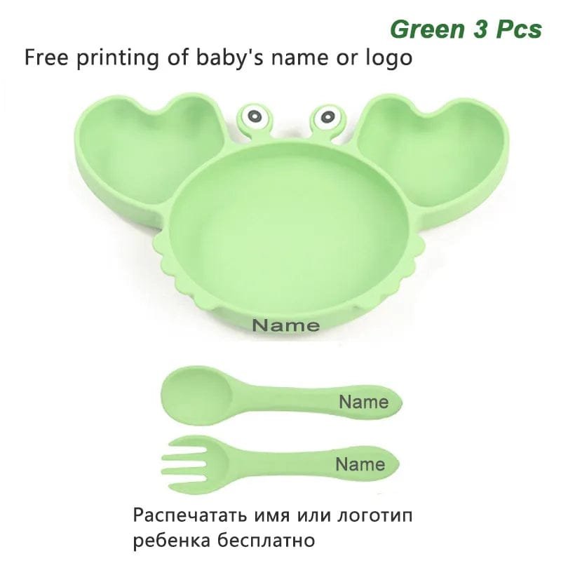 Green crab baby plate with fork and spoon, a suction dining tray that keeps toddler meals in place.