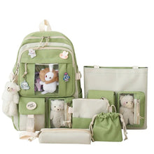 Green 5Pc Kawaii backpack set with stuffed animal charms for teen girls carrying books and laptops in style.