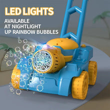 Green lawn mower bubble machine with LED lights for evening garden play and party entertainment.