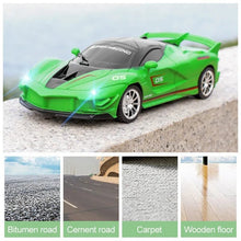 Green RC drift car built for concrete, tile and smooth road surfaces during outdoor and indoor racing.
