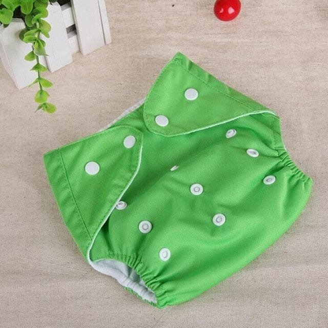 Green Washable Reusable Nappy cotton training pant for daytime nappy changes and comfortable toddler potty training.