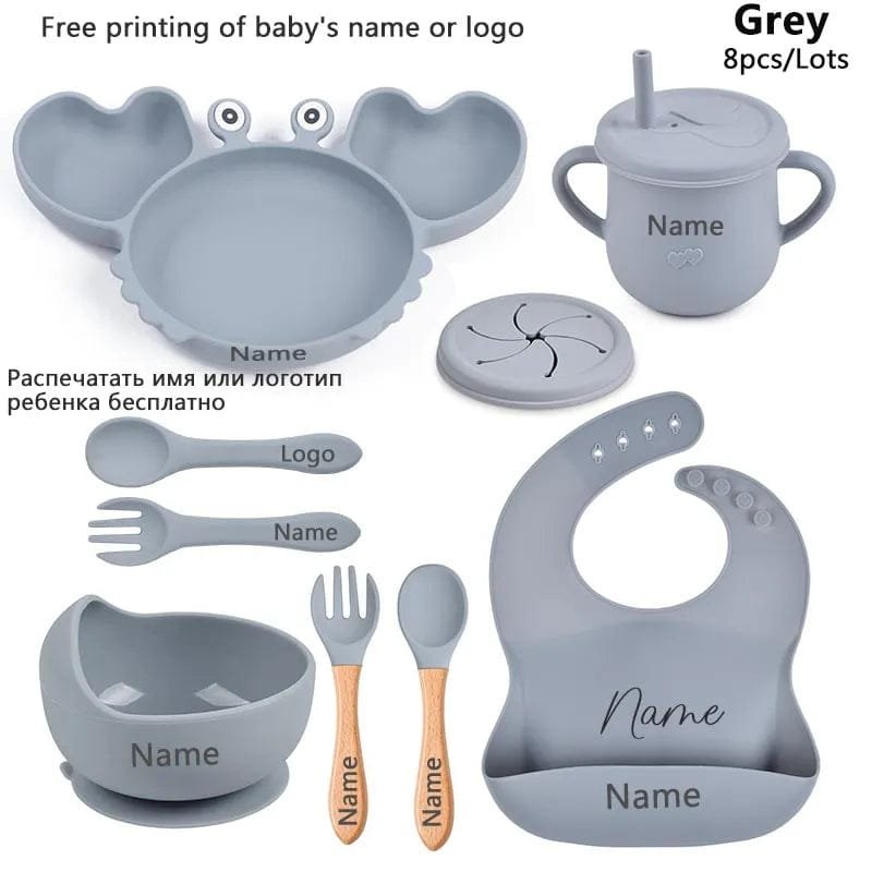 Grey baby crab dining bundle with bowls, cups, and bibs for tidy toddler mealtimes at home and nursery.