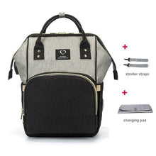 Grey and black USB Large Capacity Nappy Bag travel organiser for nappies, bottles, and wipes during busy days.