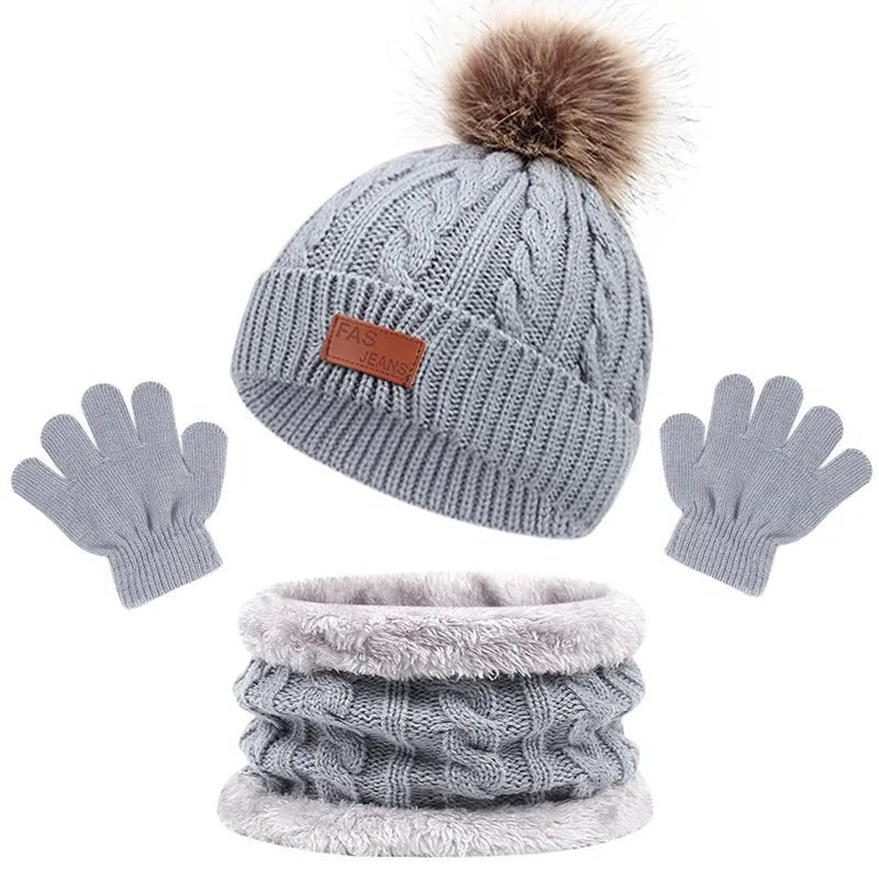 Grey cable knit beanie, gloves, and scarf 3-piece baby winter bundle for stroller walks and outdoor winter play.