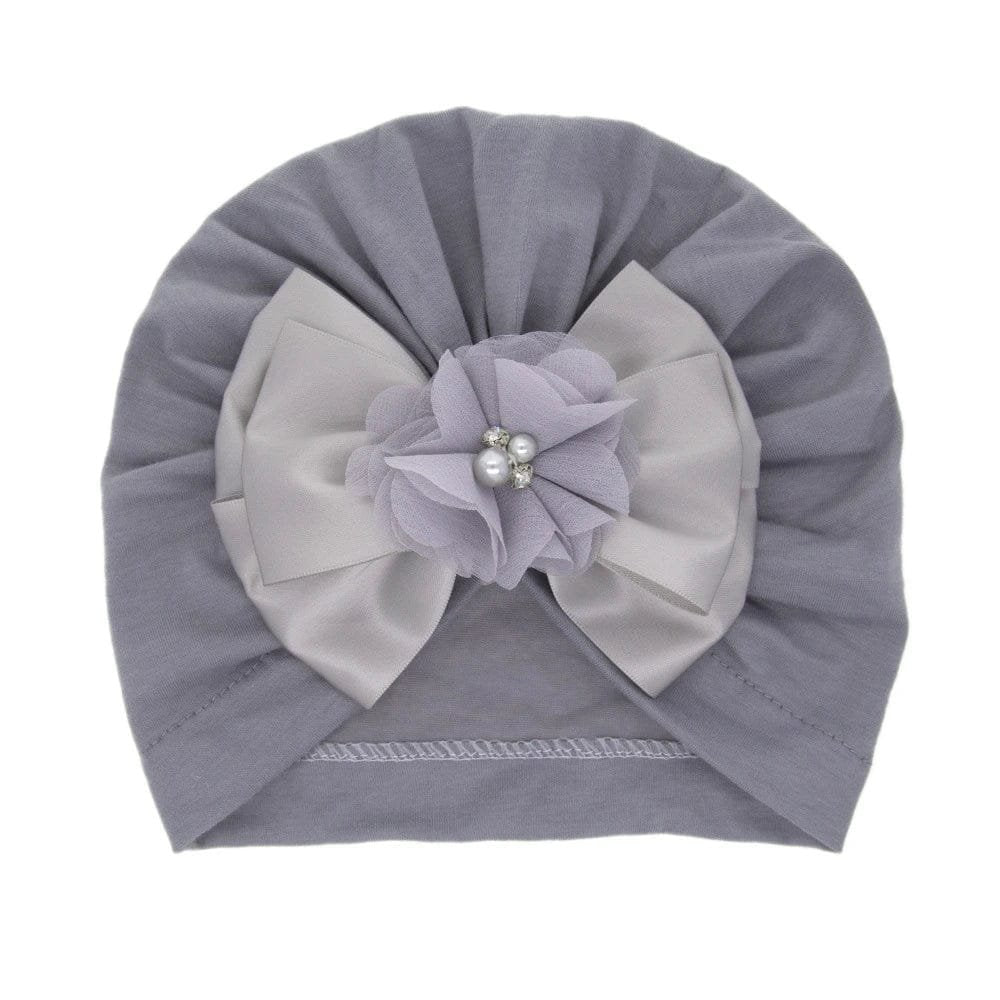 Grey flower and pearl baby turban cap in a neutral tone for everyday outfits, walks, and photo sessions.
