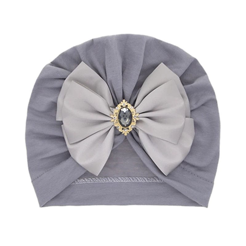 Grey large bow baby turban cap in soft cotton for everyday comfort, stroller walks, and casual outings.