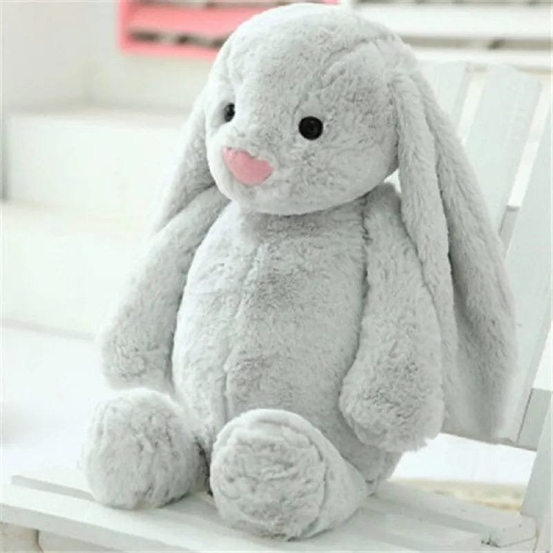 Grey long ear bunny plush doll for cuddling, nap time comfort and soft nursery styling.