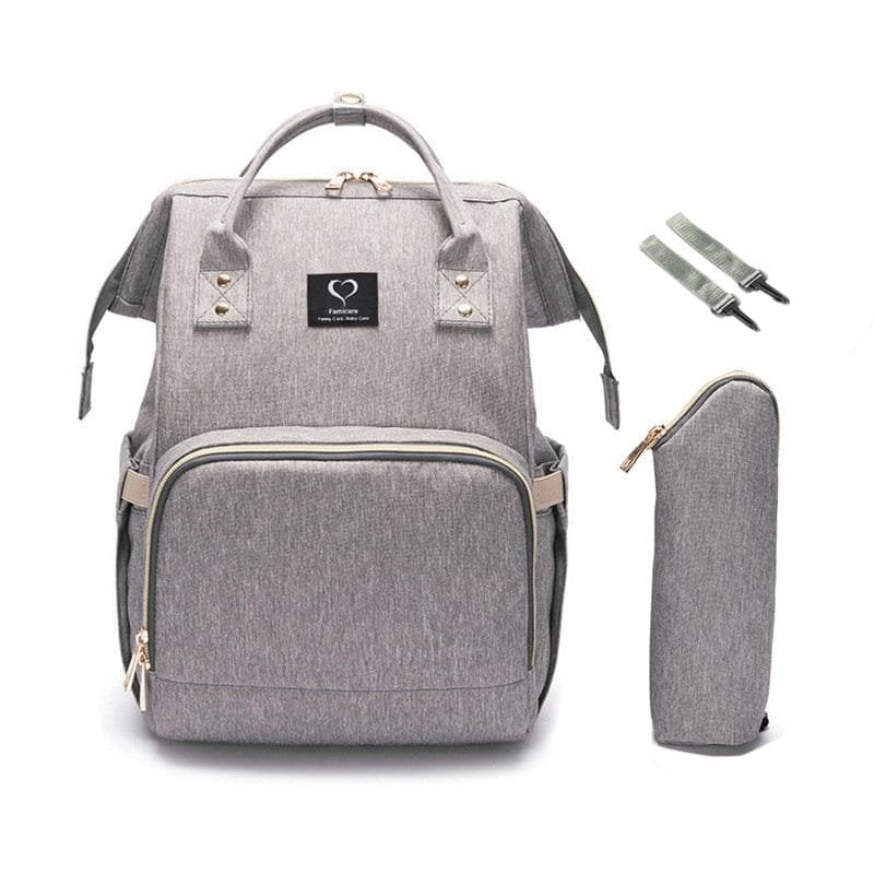 Grey nursing diaper backpack with stroller straps and pouch, a hands-free travel set for stroller walks and baby appointments.