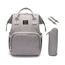 Grey nursing travel backpack for everyday parent use, holding baby care items neatly for outings, clinics, and family visits.