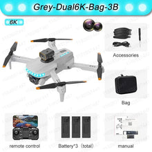 Grey P15 dual 6K drone with remote and battery accessories for outdoor filming and travel photos.