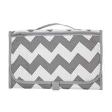 Grey and white chevron baby nappy changing bag travel pouch for storing wipes, nappies, and creams in the pram.