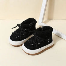 GT-CECD baby boots lifestyle shot during a stroller outing on a winter day.