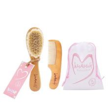 Hair brush and comb set for newborns presented as a baby shower gift idea for new parents and nursery essentials.