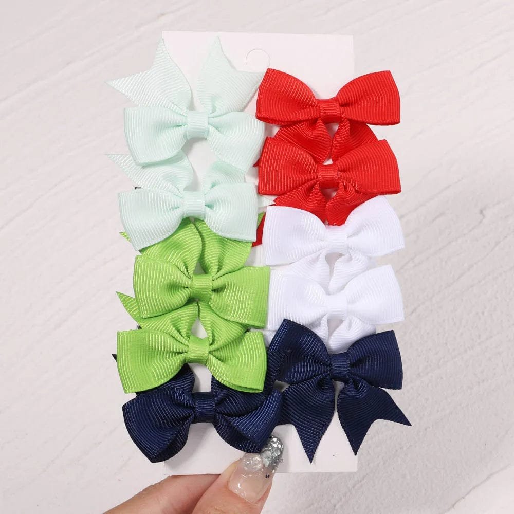 Set of 10 handmade bow hair clips for versatile girls hairstyling throughout the week.