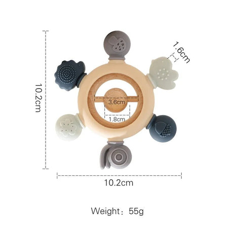 Teething ring with measurements and weight.