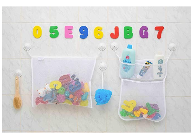 Hanging mesh bath toy organizer with suction pouches for wall mounted storage of foam letters and numbers in the bathroom.