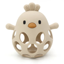 Beige hollow silicone chick teether with a textured comb