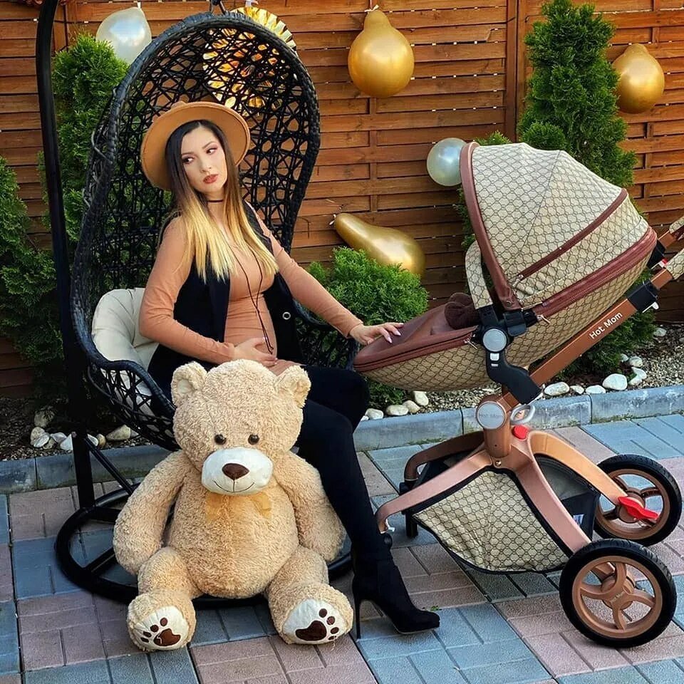 Hot Mom convertible 3-in-1 stroller set styled outdoors for lifestyle photos and daily walks.