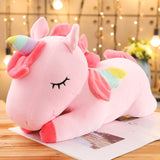Pink unicorn plush toy.