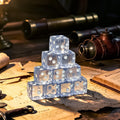 Transparent white-dot dice stacked in a pyramid on an old map beside brass antiques
