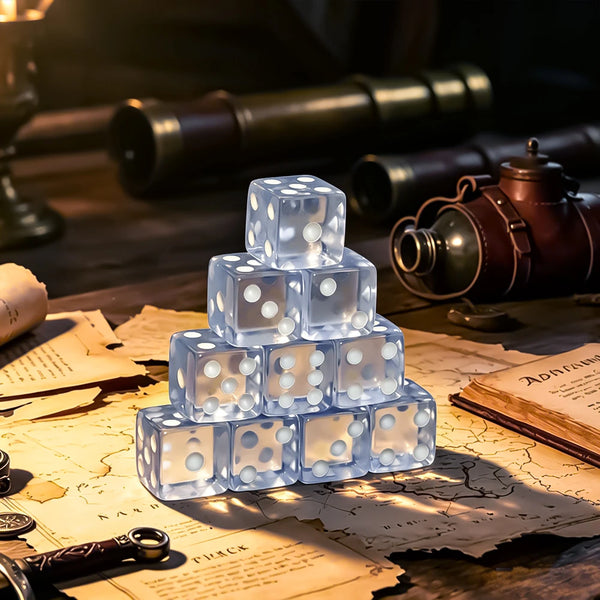 Transparent white-dot dice stacked in a pyramid on an old map beside brass antiques