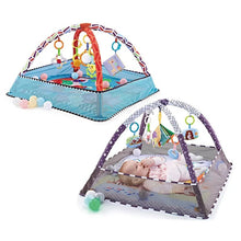 Baby play mat with colorful toys and a baby lying on it
